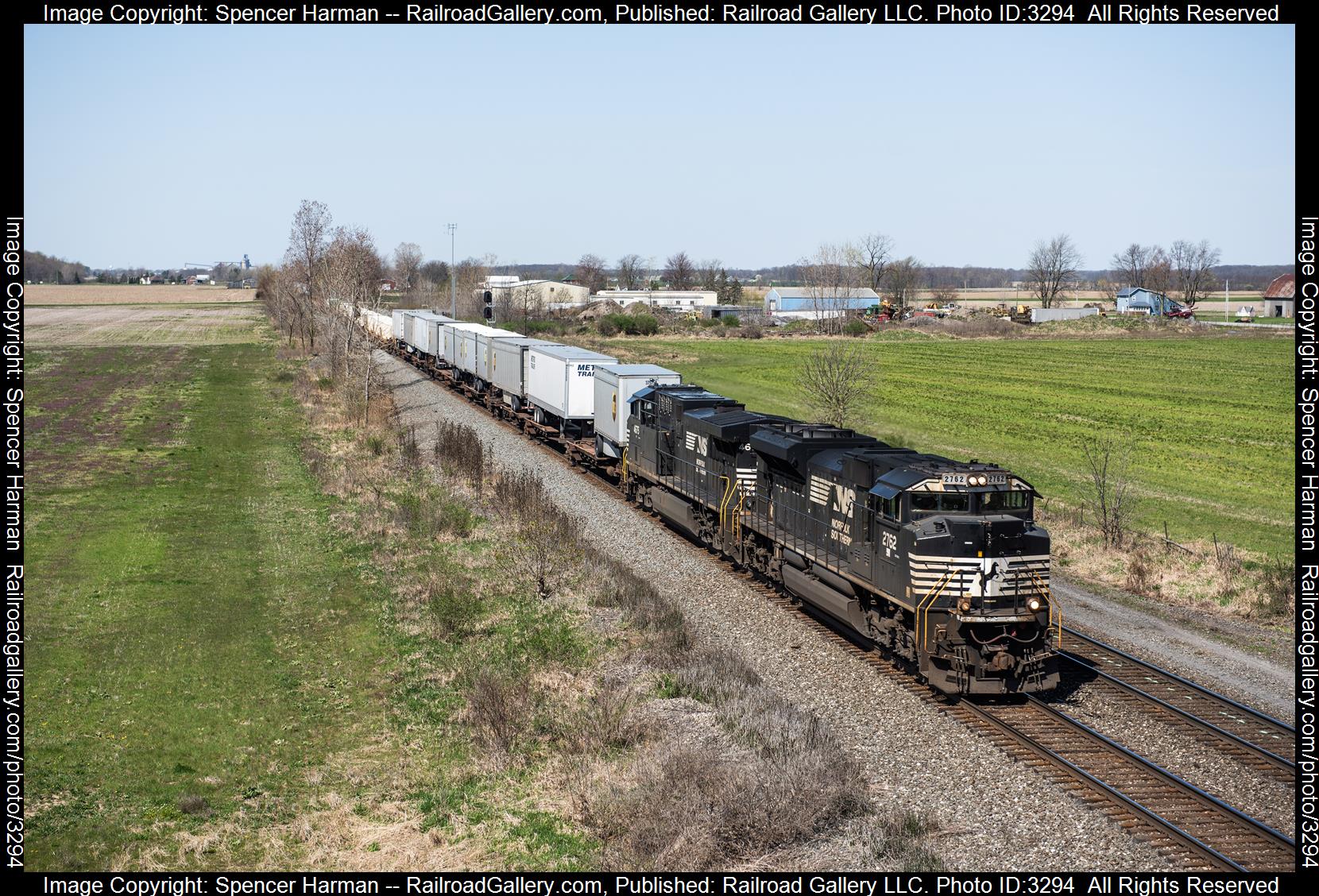 NS 2762 is a class EMD SD70M-2 and  is pictured in Butler, Indiana, USA.  This was taken along the Chicago Line on the Norfolk Southern. Photo Copyright: Spencer Harman uploaded to Railroad Gallery on 04/15/2024. This photograph of NS 2762 was taken on Sunday, April 14, 2024. All Rights Reserved. 